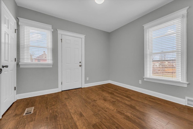 empty room featuring hardwood / wood-style floors