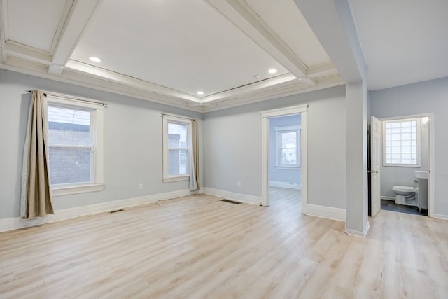 unfurnished room with beamed ceiling, light hardwood / wood-style floors, a healthy amount of sunlight, and coffered ceiling