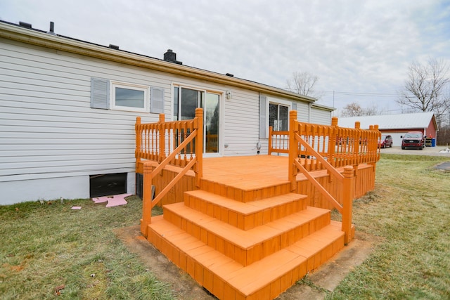 wooden deck with a yard