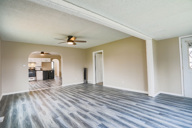 unfurnished living room with wood-type flooring, a textured ceiling, and ceiling fan