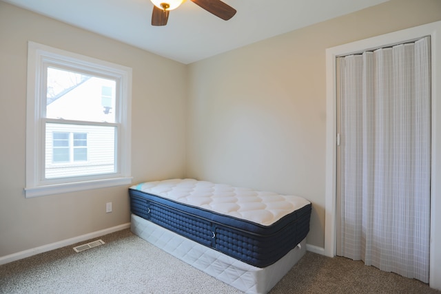 bedroom featuring carpet and ceiling fan