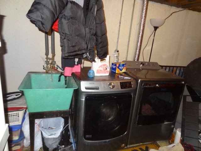 laundry area featuring washing machine and dryer