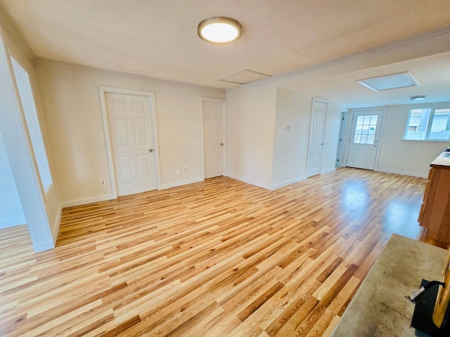 unfurnished room featuring light hardwood / wood-style floors