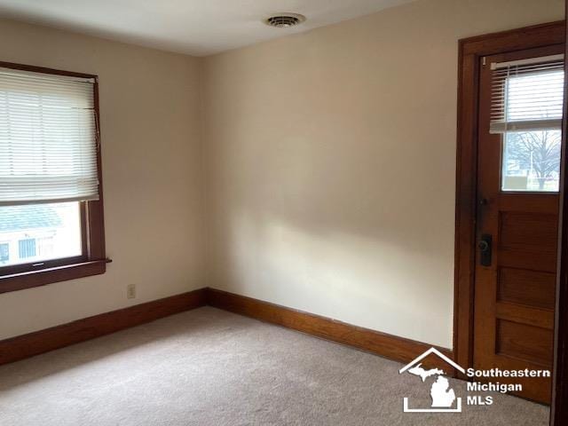 empty room with carpet floors