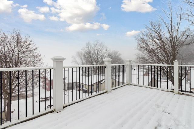 view of snow covered deck