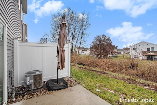 view of yard with central AC unit