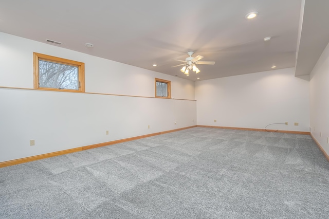 carpeted empty room with ceiling fan