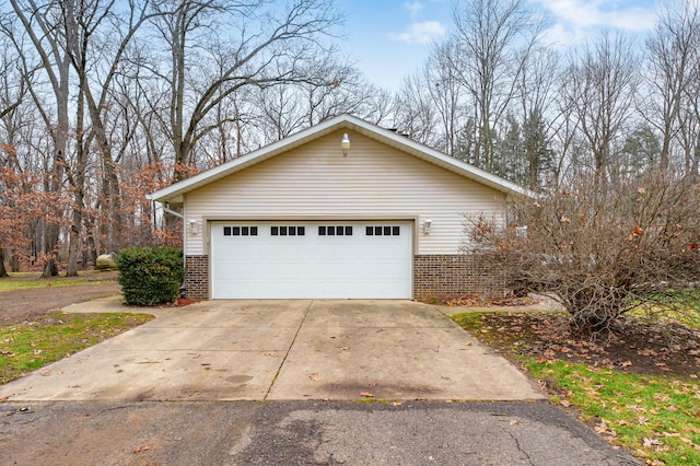 view of side of home with a garage