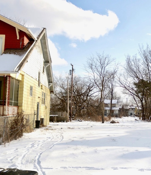 view of snow covered property