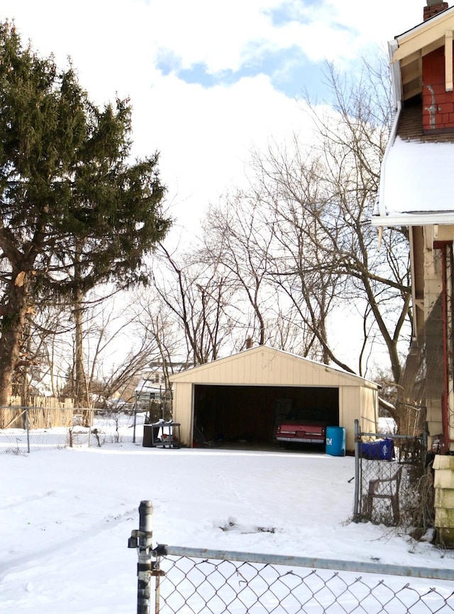 view of snow covered garage