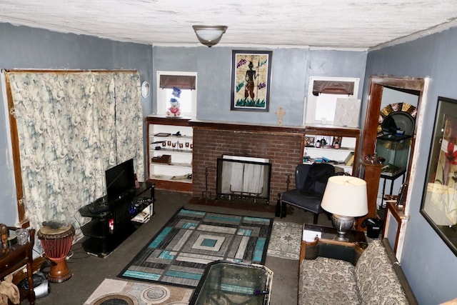 living room featuring a brick fireplace