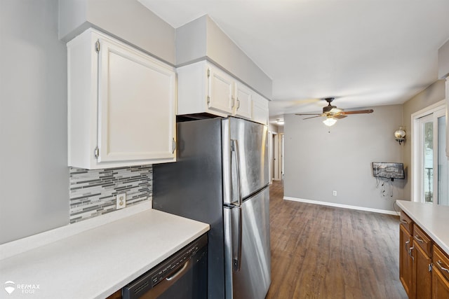 kitchen featuring white cabinetry, decorative backsplash, ceiling fan, and stainless steel appliances