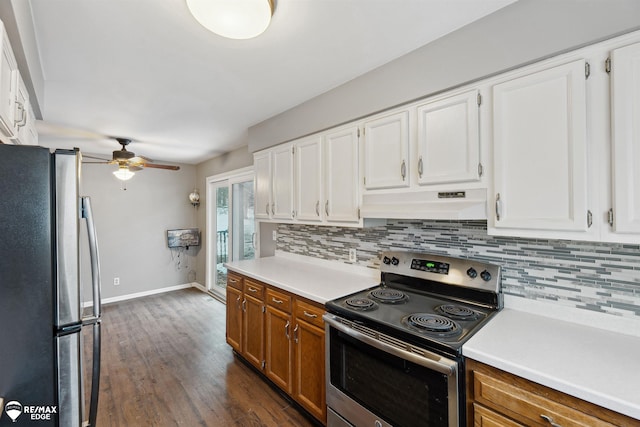 kitchen featuring white cabinets, stainless steel appliances, and ceiling fan