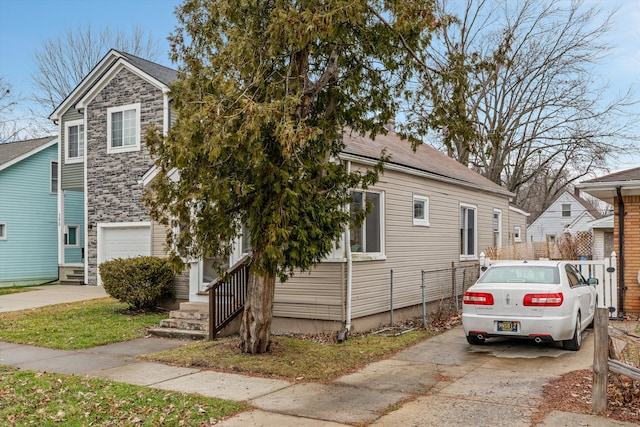 view of front of property with a garage