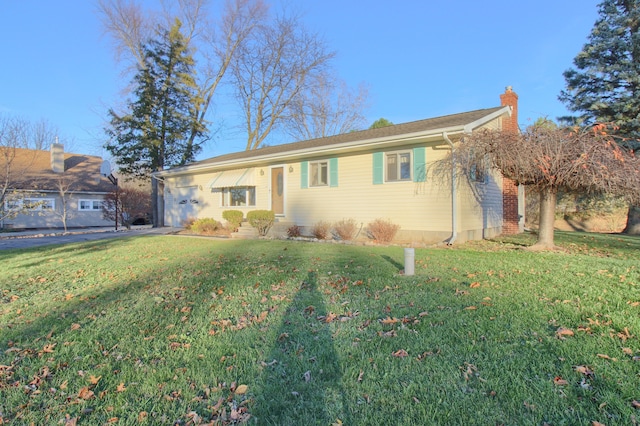 ranch-style house featuring a front lawn