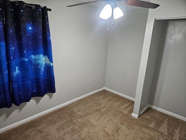 unfurnished bedroom with carpet and ceiling fan