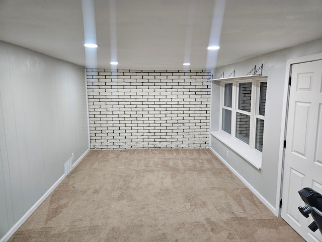 spare room with light carpet