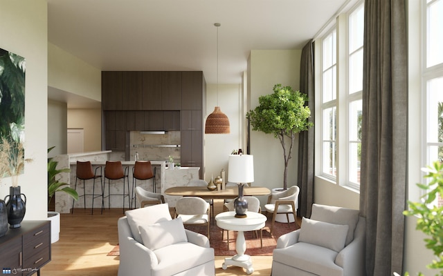 sitting room with light hardwood / wood-style floors