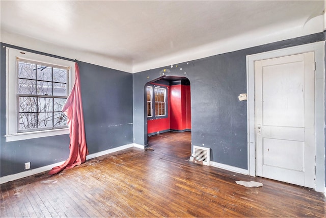 spare room featuring hardwood / wood-style flooring