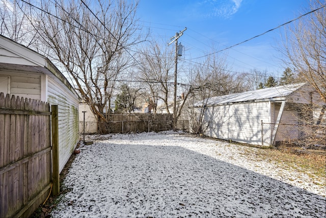 view of yard covered in snow