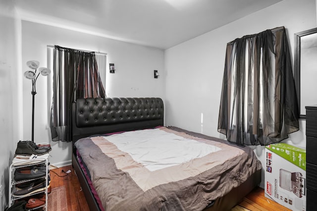 bedroom featuring wood-type flooring