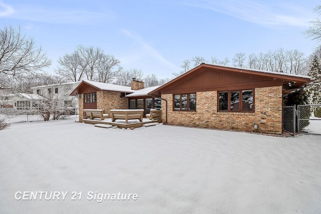 view of snow covered property