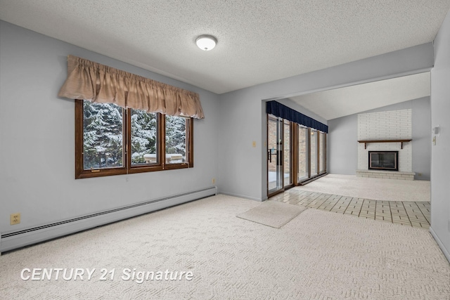 unfurnished living room featuring a textured ceiling, a fireplace, vaulted ceiling, and a baseboard heating unit