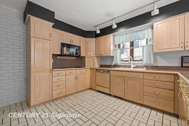 kitchen featuring light brown cabinets, sink, track lighting, and black appliances