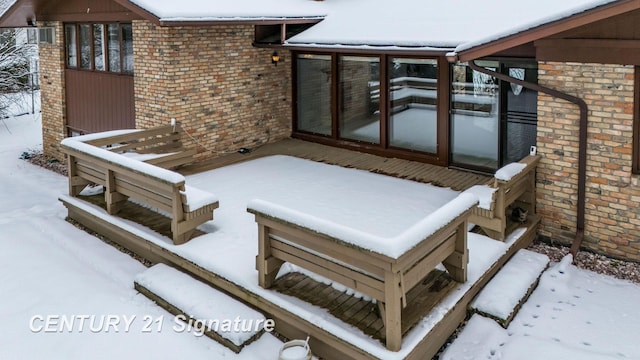 view of snow covered patio