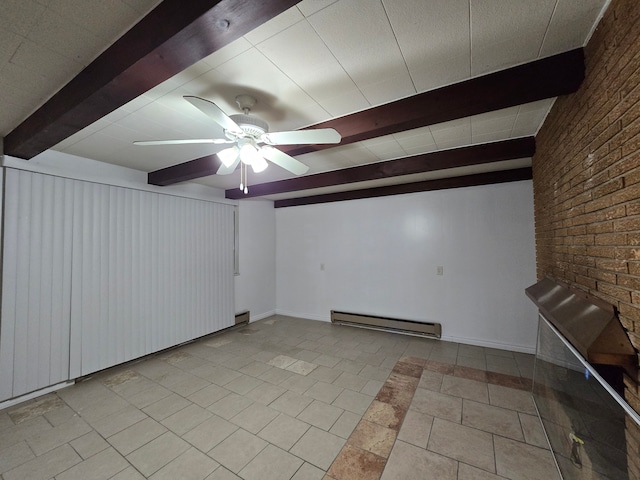 tiled spare room featuring beam ceiling, ceiling fan, a baseboard heating unit, and brick wall