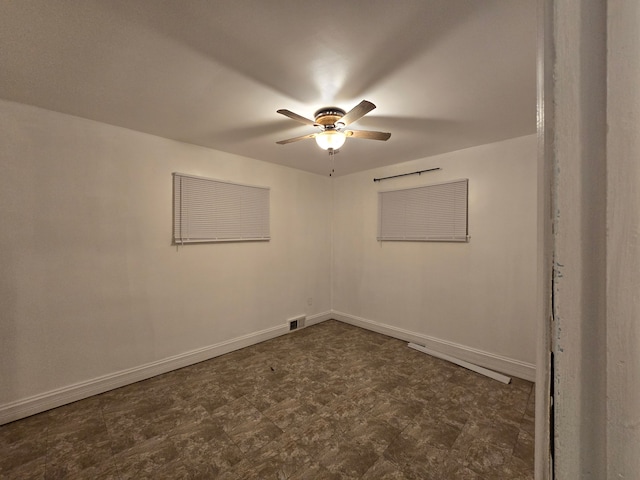 unfurnished room featuring ceiling fan