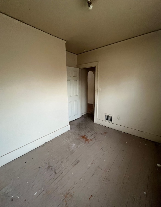 empty room with light hardwood / wood-style floors