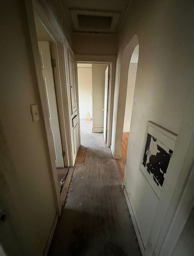 corridor featuring hardwood / wood-style flooring