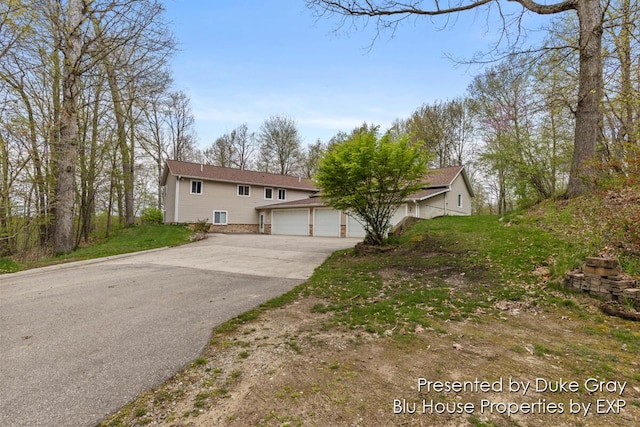 view of front of property with a garage