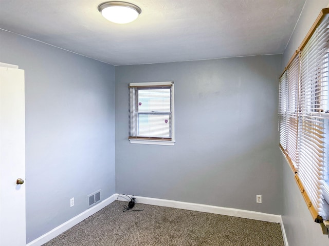 view of carpeted spare room