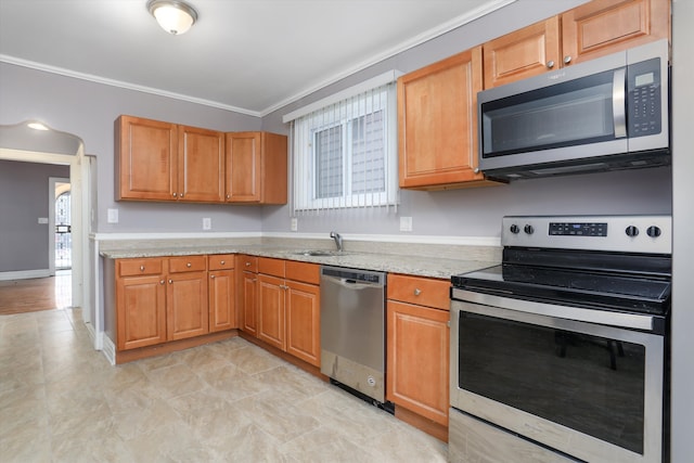 kitchen with crown molding, sink, and appliances with stainless steel finishes