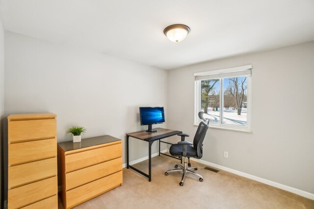 home office with baseboards, visible vents, and carpet flooring