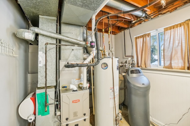 utility room featuring water heater