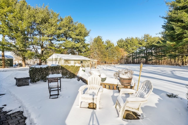 view of snow covered patio