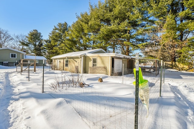 view of front of property with fence