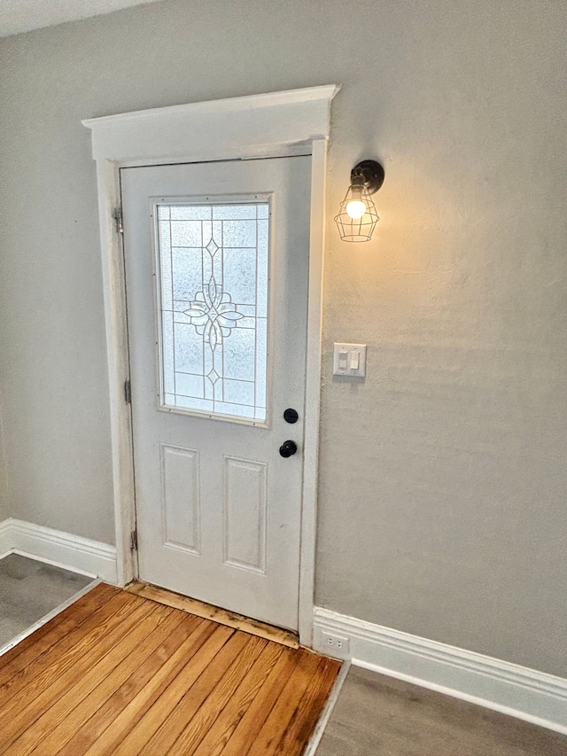 doorway featuring hardwood / wood-style flooring