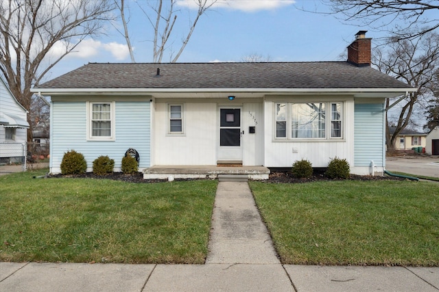 view of front of home with a front yard