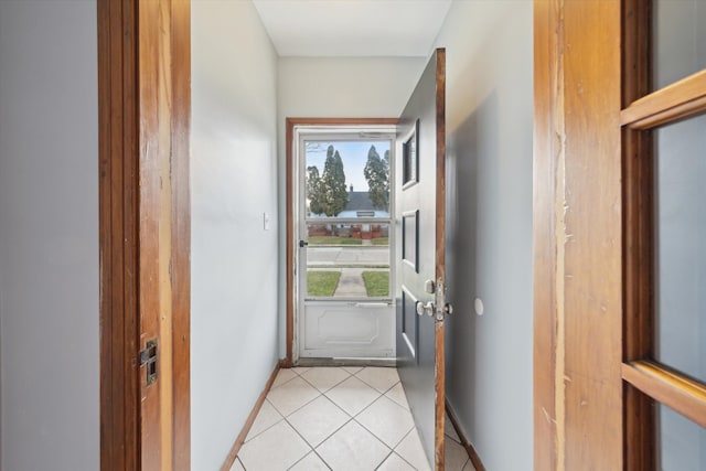 doorway featuring light tile patterned floors