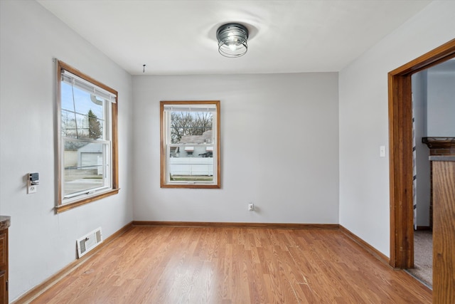 empty room featuring light hardwood / wood-style floors