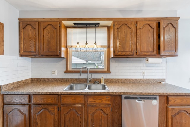 kitchen with dishwasher, tasteful backsplash, and sink