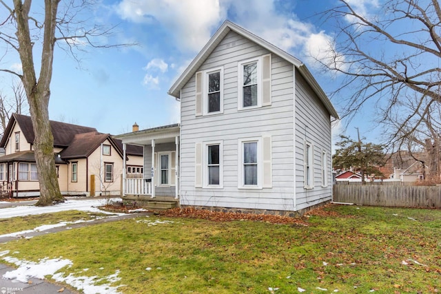 view of front of home featuring a porch and a front yard