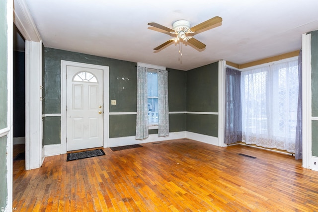 entrance foyer featuring wood-type flooring and ceiling fan