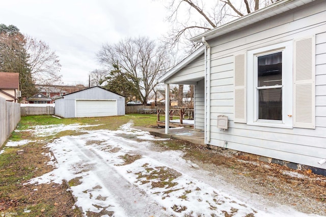 exterior space with an outdoor structure and a garage