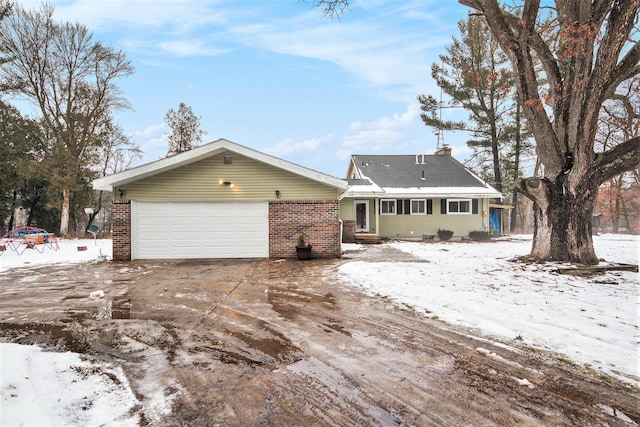 view of front of home with a garage