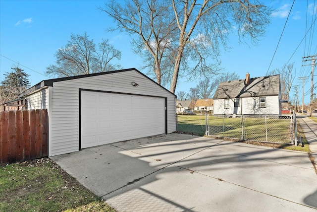 garage with a yard